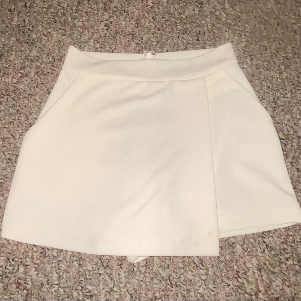 light pinkish cream, skort, worn twice, zipper, good condition